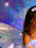 An Wishful Portraits portrait, a child with iridescent wings on a storybook set